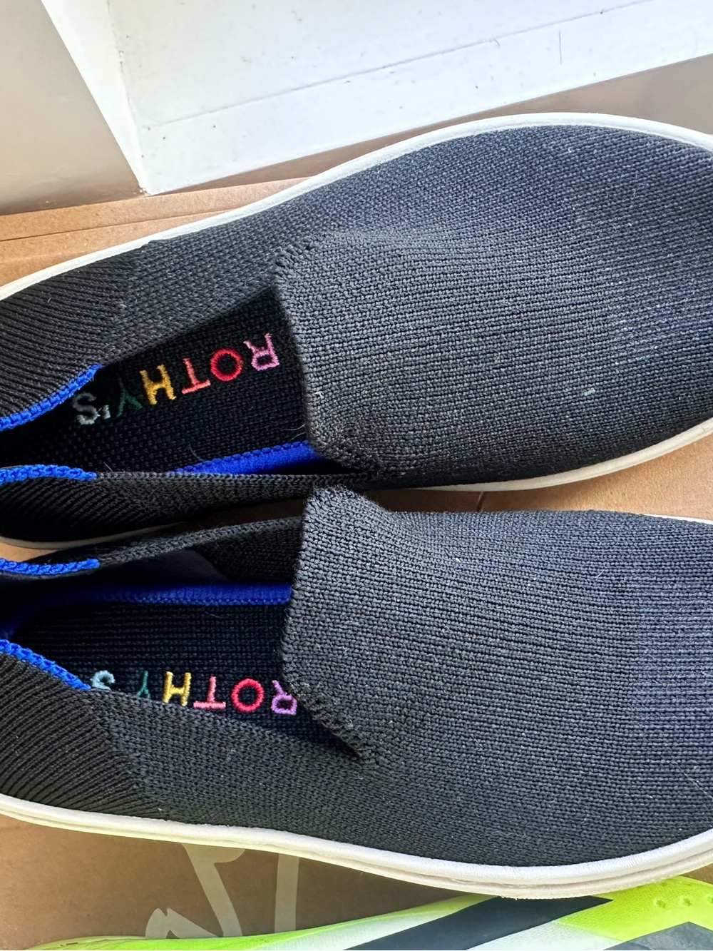 Rothy's kids Black Knit Slip-On Loafers with Blue Trim